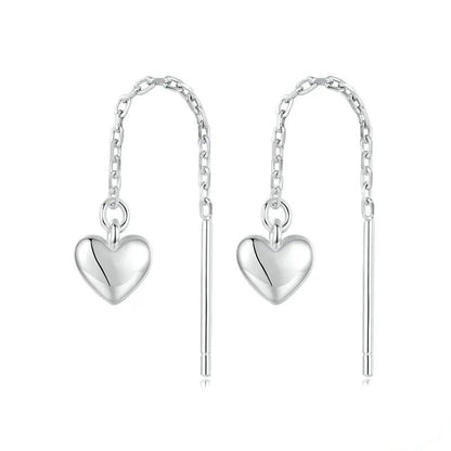 Boucles d'oreilles pendantes en forme de cœur simples avec longs glands