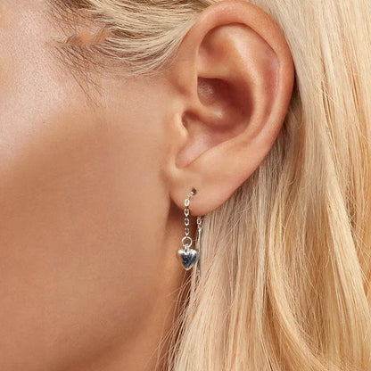 Boucles d'oreilles pendantes en forme de cœur simples avec longs glands